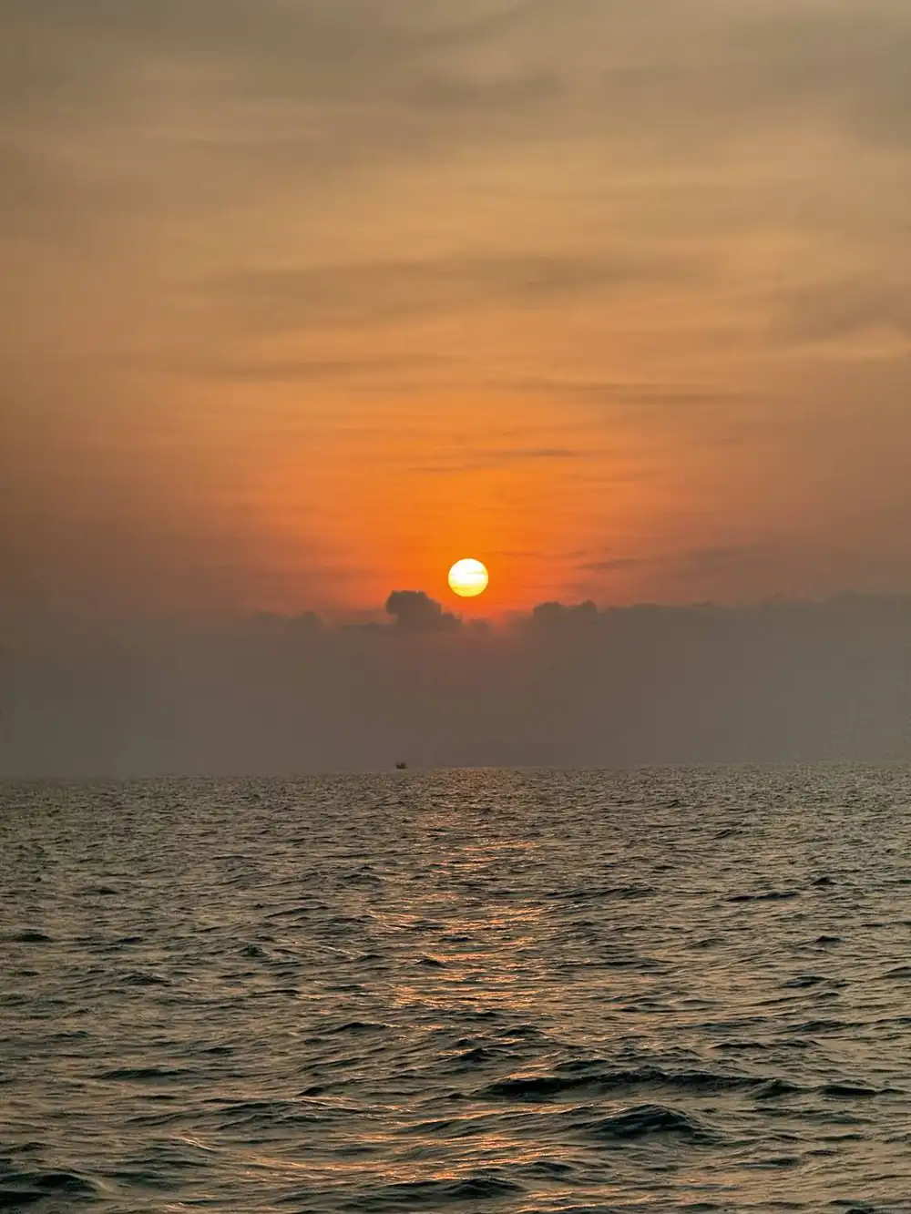 Warm sunset glow over calm water